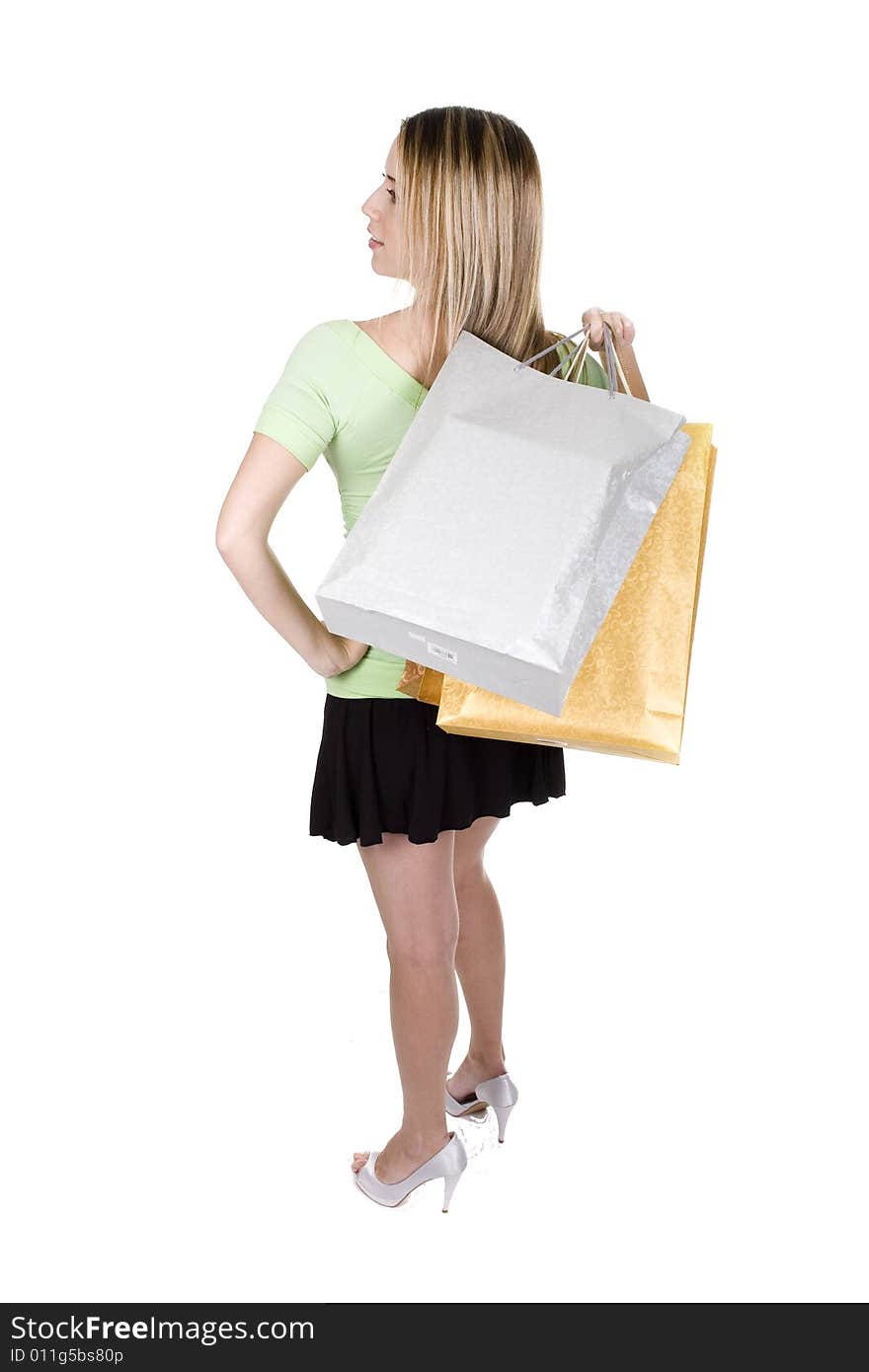 Woman with shopping bags over white background