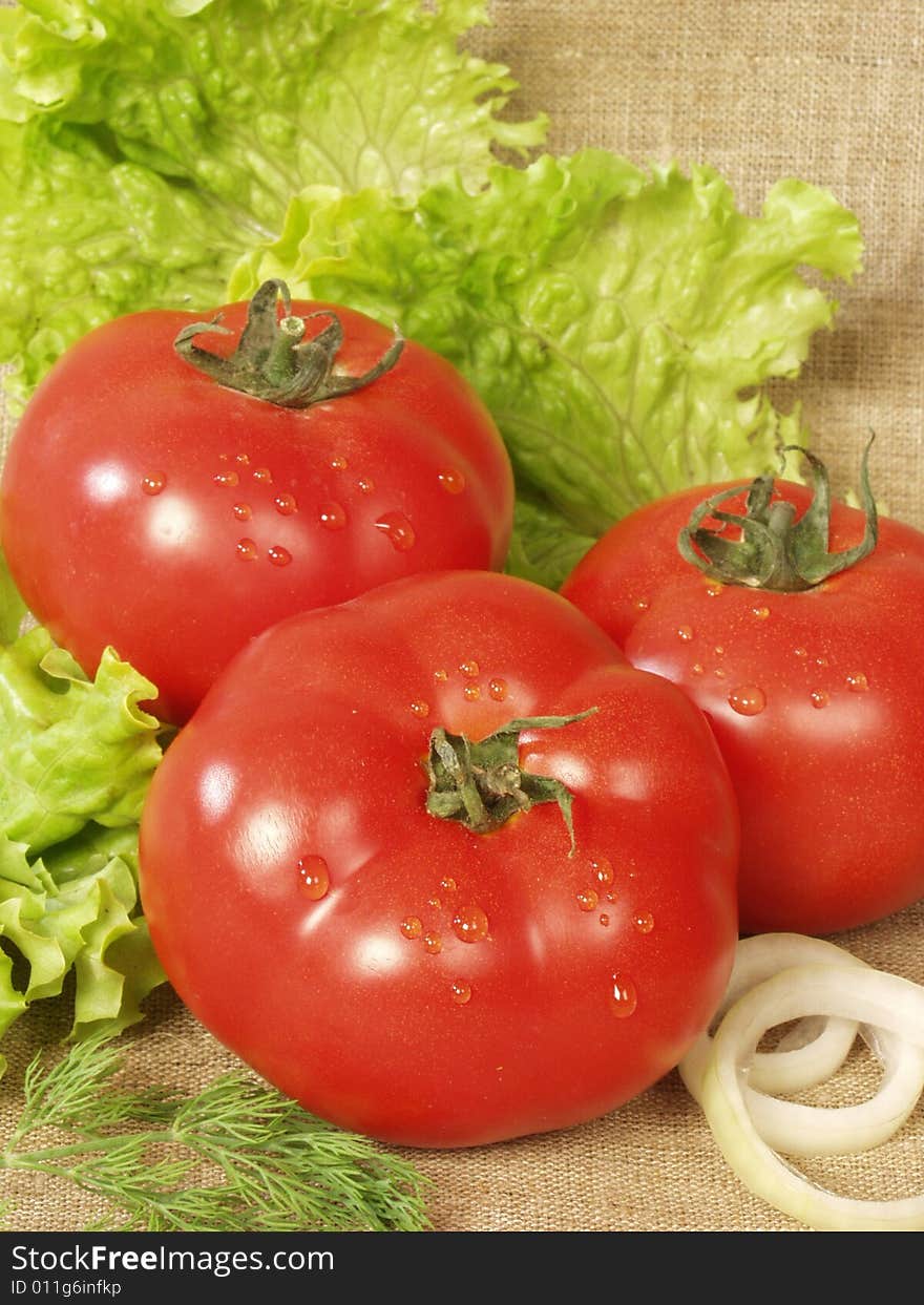 Three red tomatoes