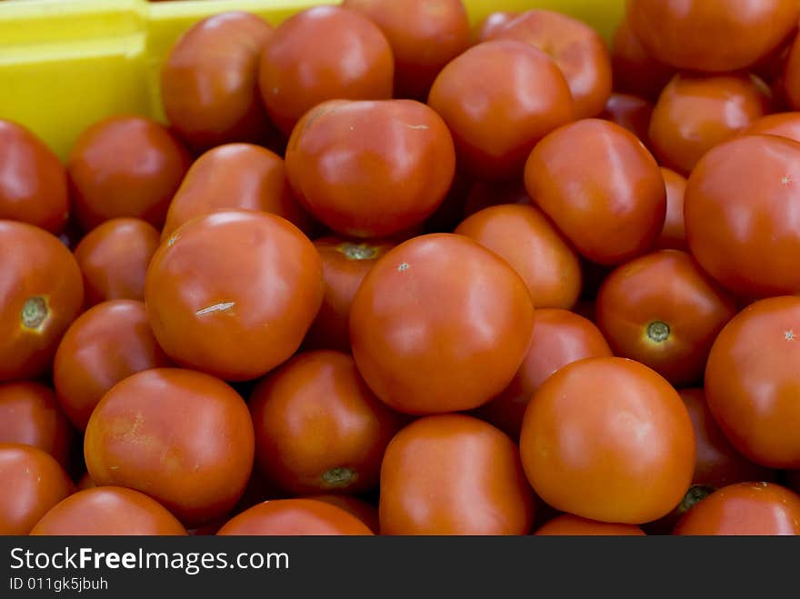 Beautiful red tomatoes at a local market.