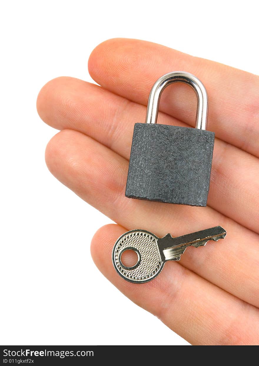 Lock and key on hand isolated on white background