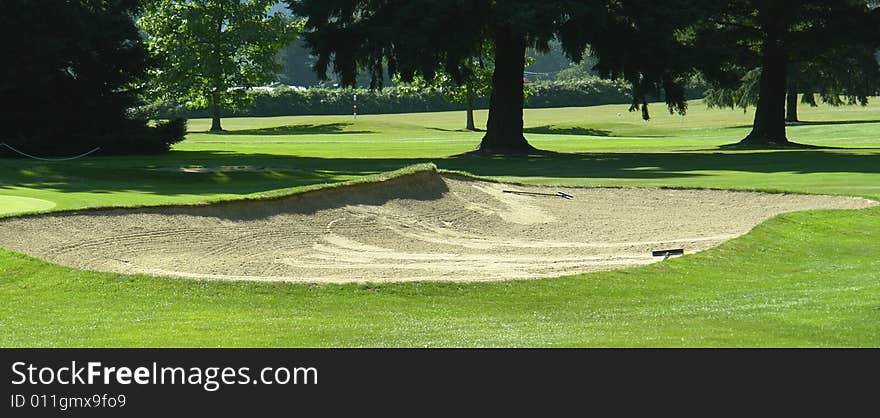 Sand trap near the green onan executive golf course. Sand trap near the green onan executive golf course