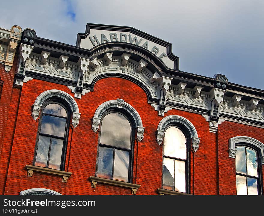 View of historic old hardware building with ornate detail.