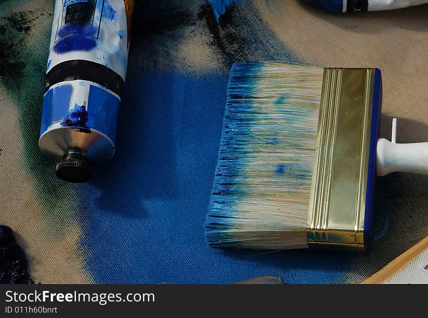 Blue color on a brush, from a art painter