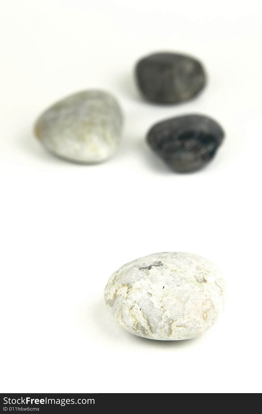 River rocks isolated against a white background