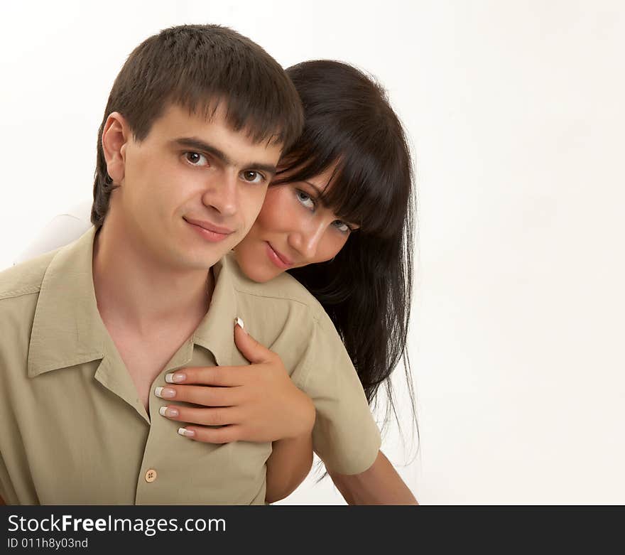 Young couple on a white background. Young couple on a white background