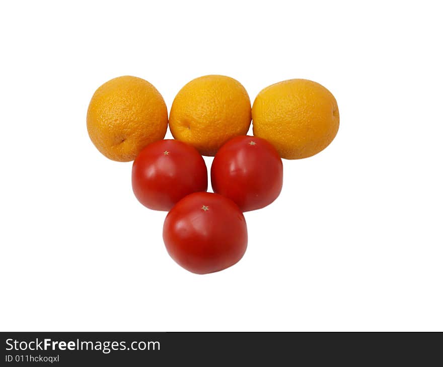 Oranges and tomatoes on a white background are combined by a triangle