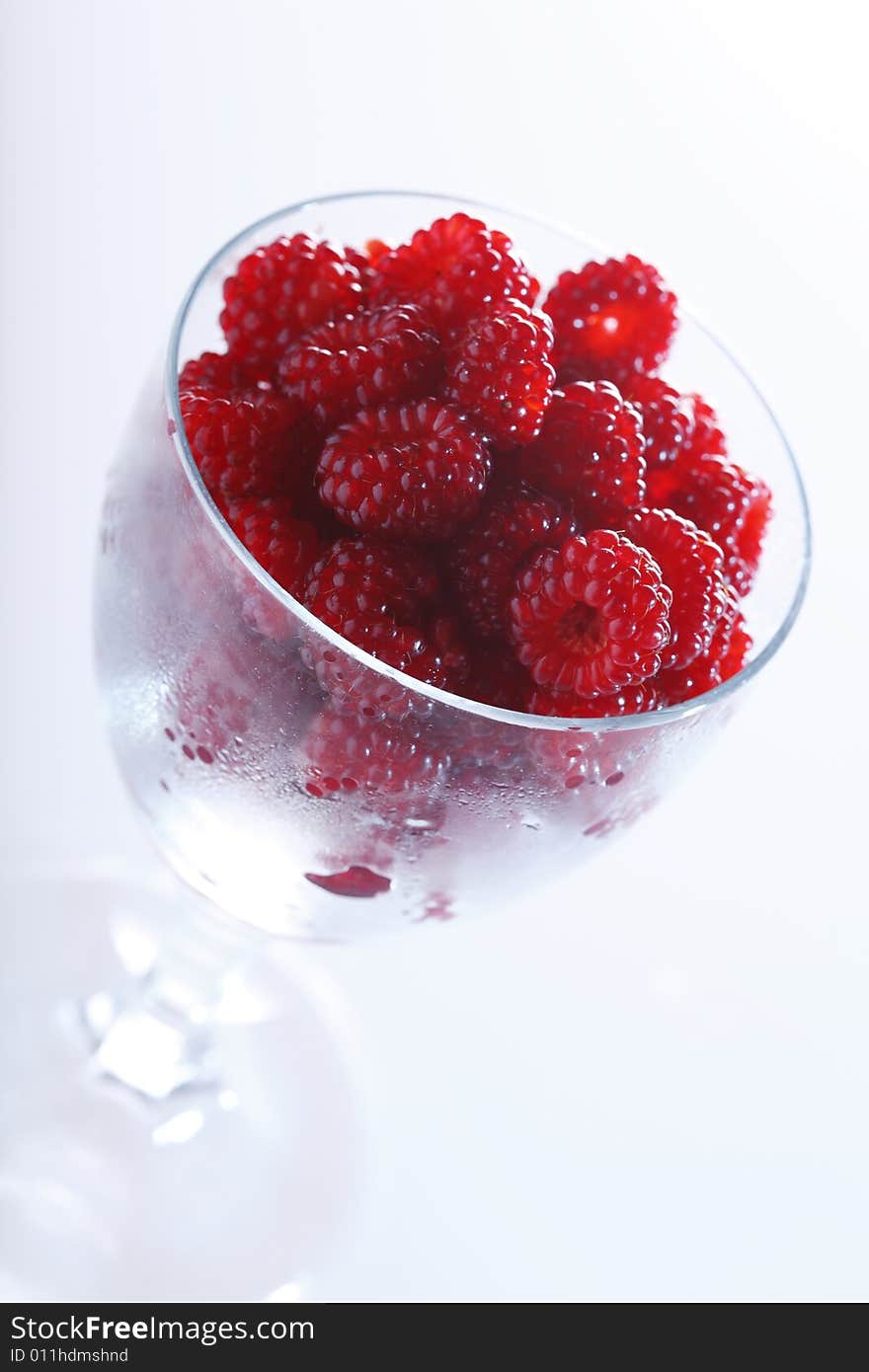 Raspberries in a glass