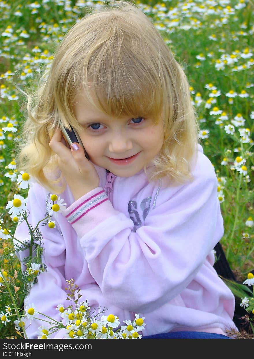 Little Girl With Mobile Telephone.