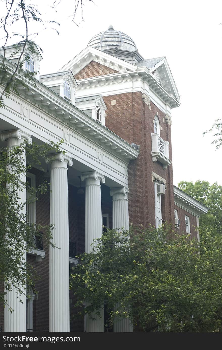 Large brick Colonial edifice could be on campus, in an office park, or housing government operations. Large brick Colonial edifice could be on campus, in an office park, or housing government operations.