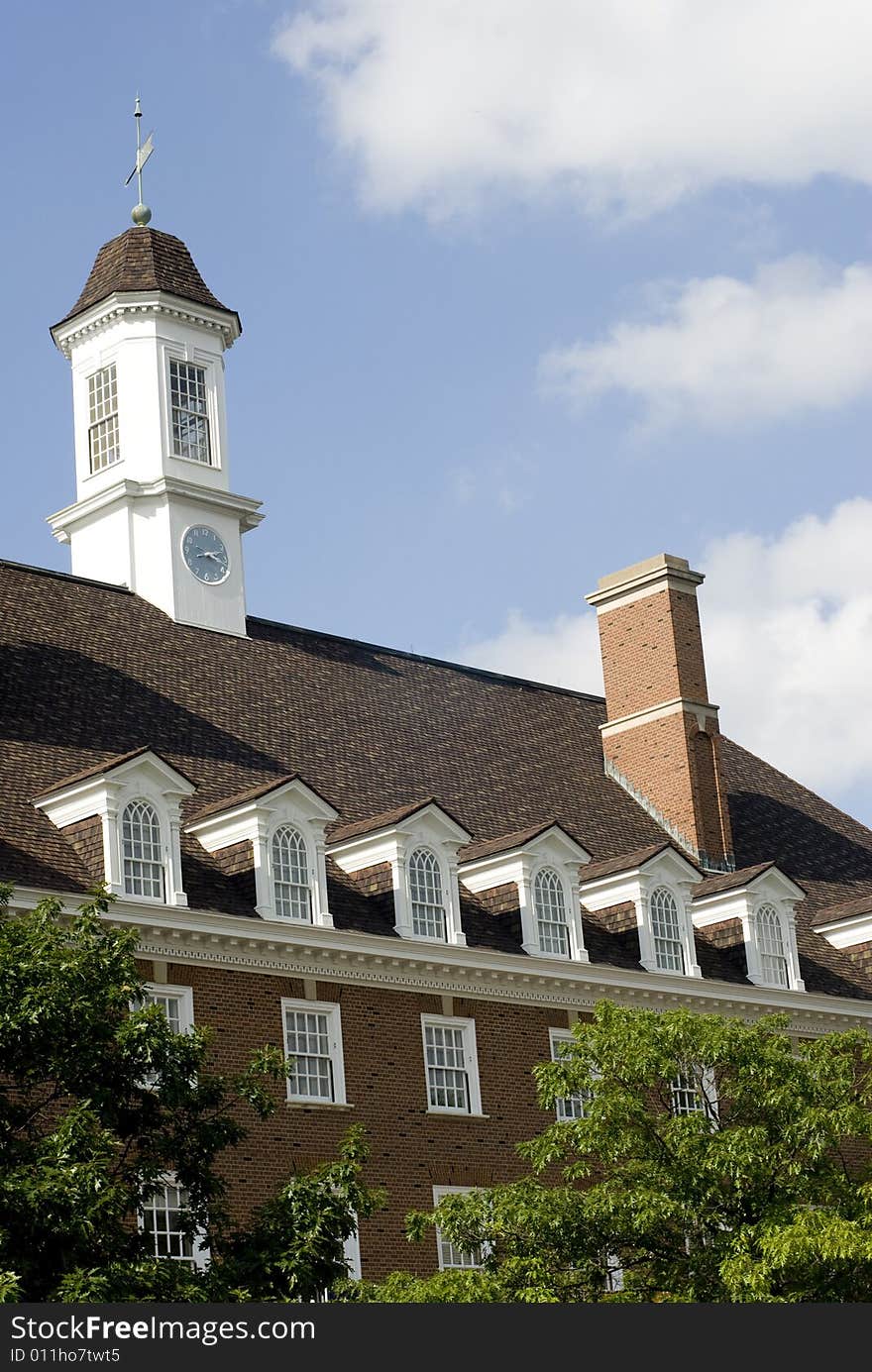 Exterior shot of a colonial-style brick building. Exterior shot of a colonial-style brick building.