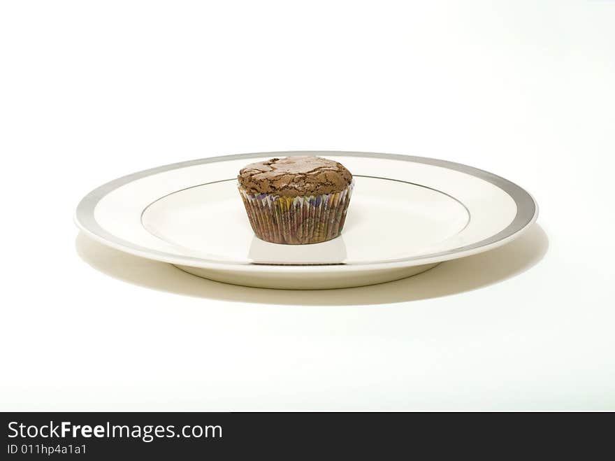 Freshly baked morsel isolated on a white tabletop. Freshly baked morsel isolated on a white tabletop