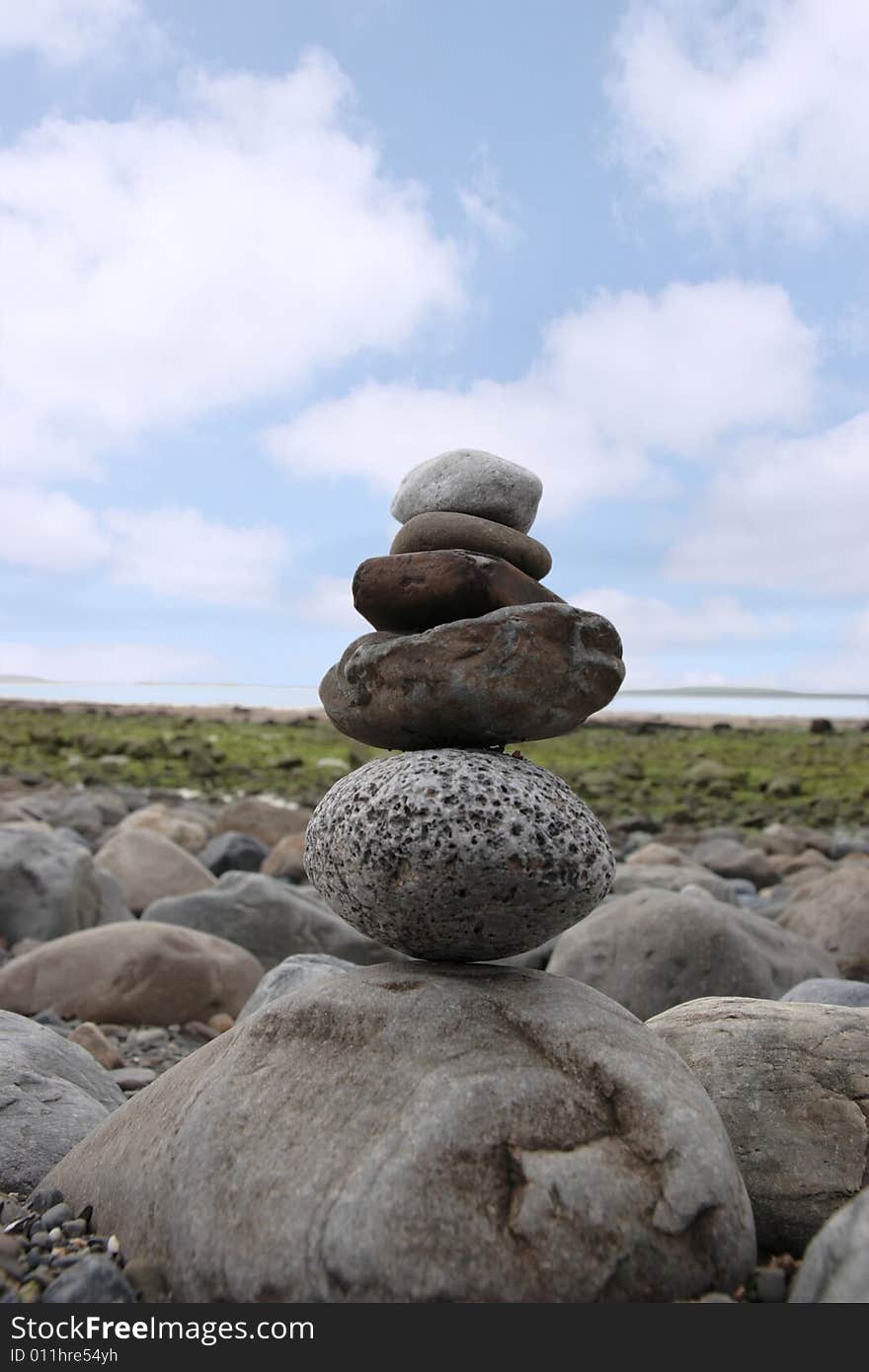 Stones stacked on top of each other to show creativity. Stones stacked on top of each other to show creativity