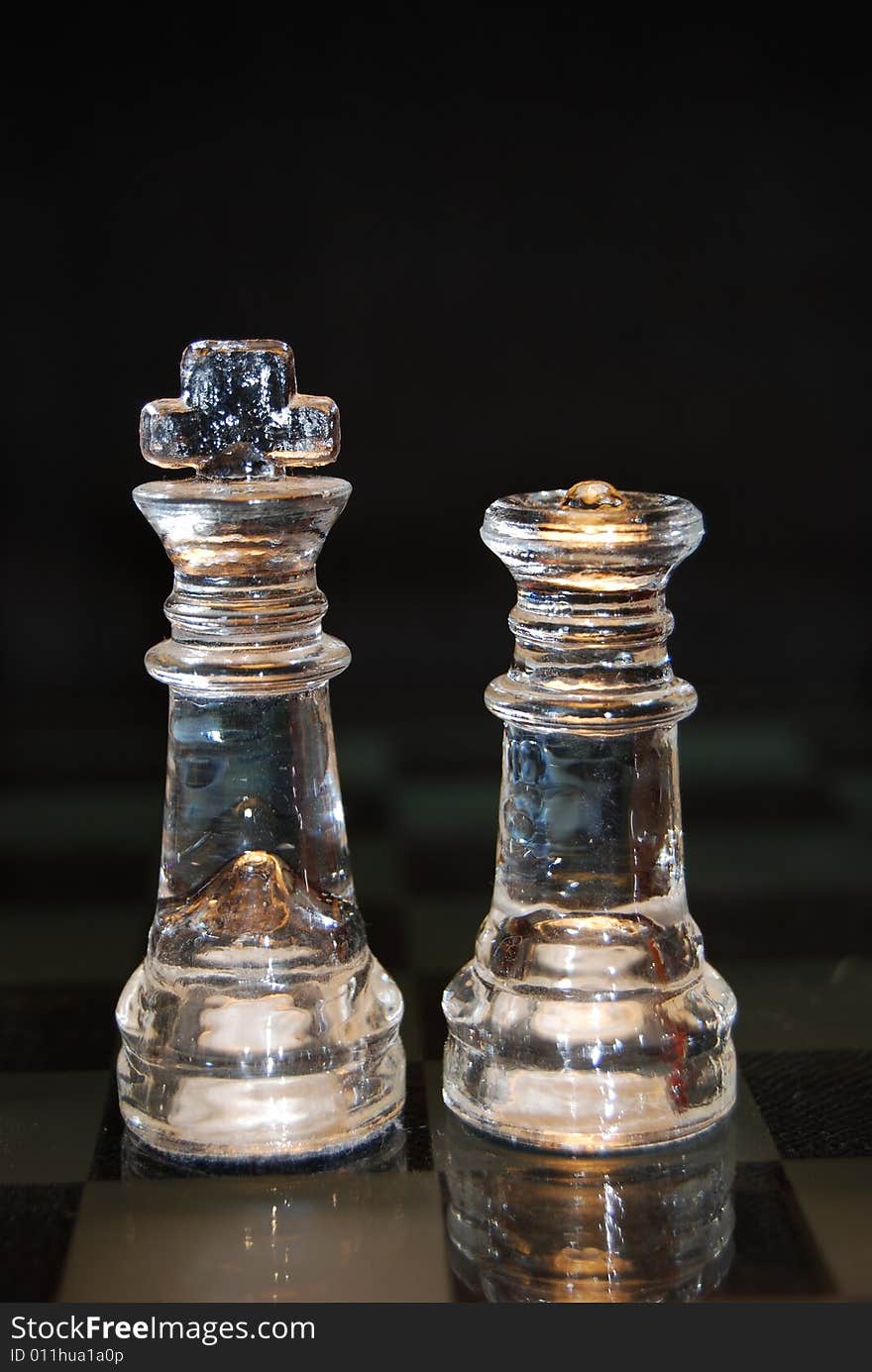 Glass king and queen pieces. Glass king and queen pieces