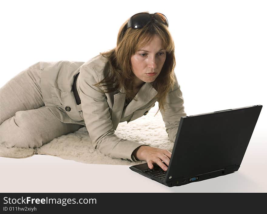 Young women with laptop on white. Young women with laptop on white