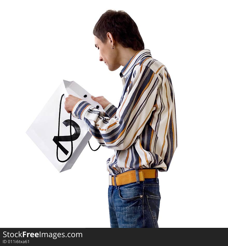 Man looks in gift package, on white background. Man looks in gift package, on white background