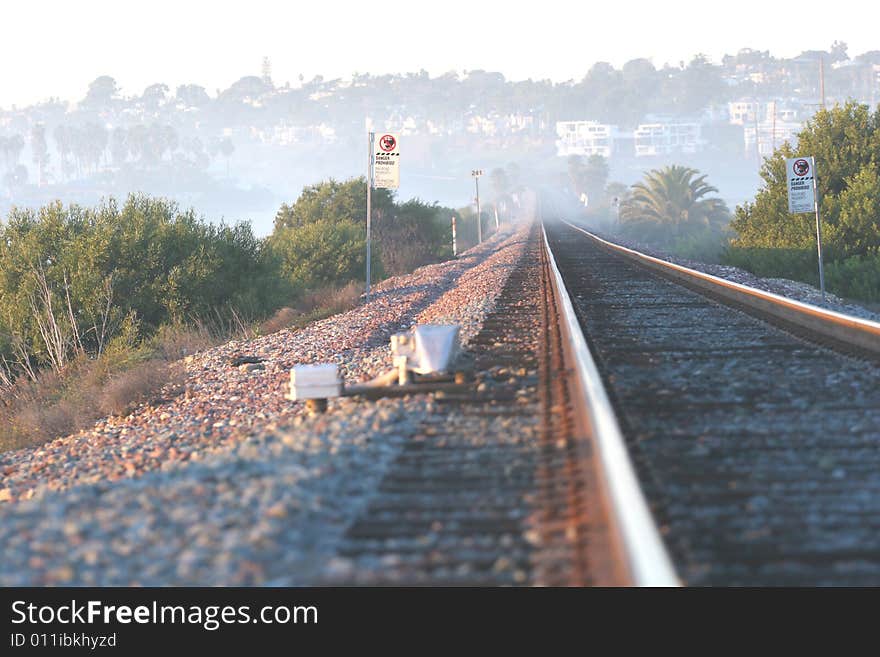 This is the Amtrak train tracks in North County San Diego that run right along the coast. A lagoon off in the distance shows a fog on the train tracks. . This is the Amtrak train tracks in North County San Diego that run right along the coast. A lagoon off in the distance shows a fog on the train tracks.