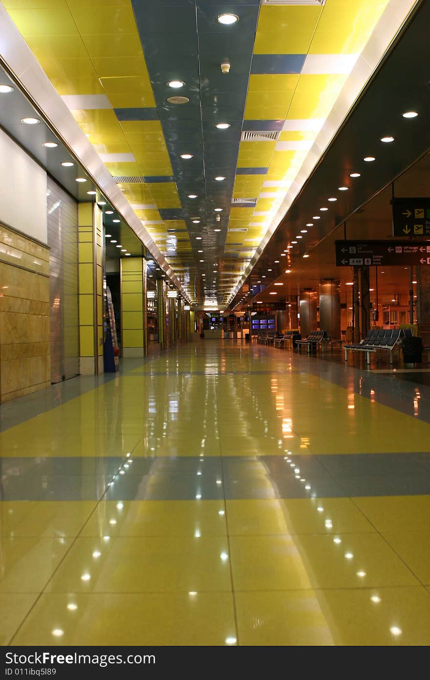 This picture was taken at the Grand Canary Island Airport at about 2am.  The yellow sets a retro tone while the reflection ads a futuristic touch. This picture was taken at the Grand Canary Island Airport at about 2am.  The yellow sets a retro tone while the reflection ads a futuristic touch