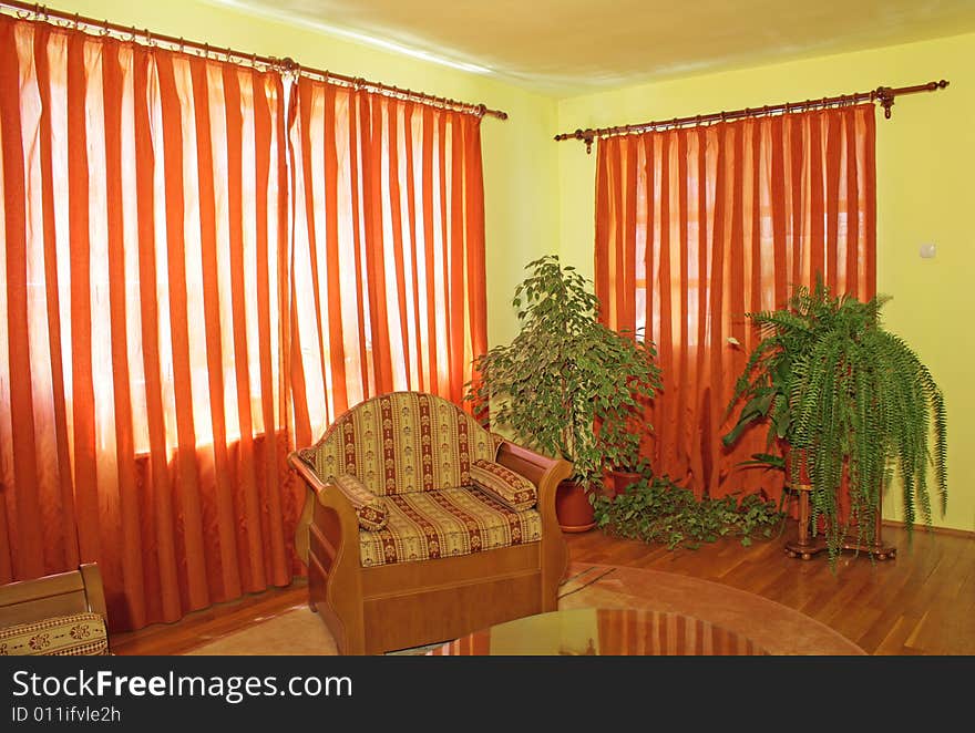 Yellow living room interior with wooden furniture. Yellow living room interior with wooden furniture