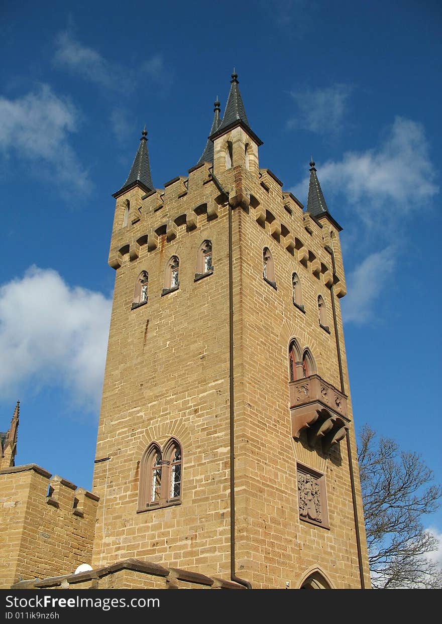 The tower of this ancient castle seems to soar above the clouds themselves. This castle is in southern Germany. The tower of this ancient castle seems to soar above the clouds themselves. This castle is in southern Germany.