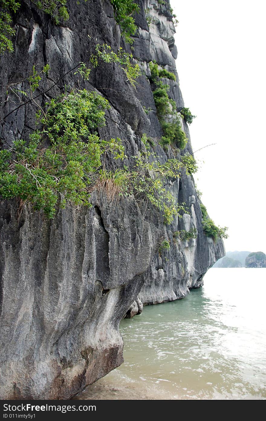 Traveling through scenic and tropical ha long bay in northern vietnam. Traveling through scenic and tropical ha long bay in northern vietnam