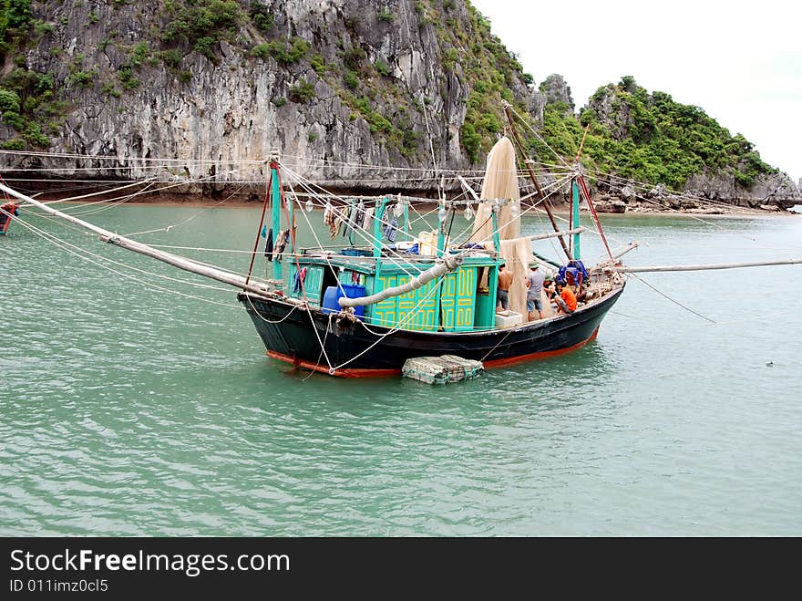 A floating fisherman's boat in ha long bay, northern vietnam. A floating fisherman's boat in ha long bay, northern vietnam