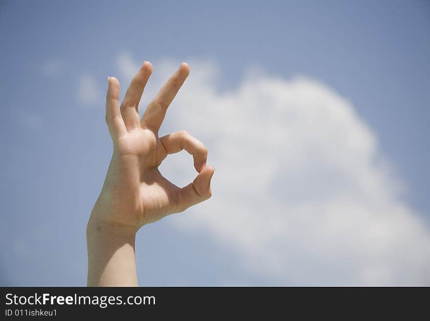 OK sign with blue sky in the background