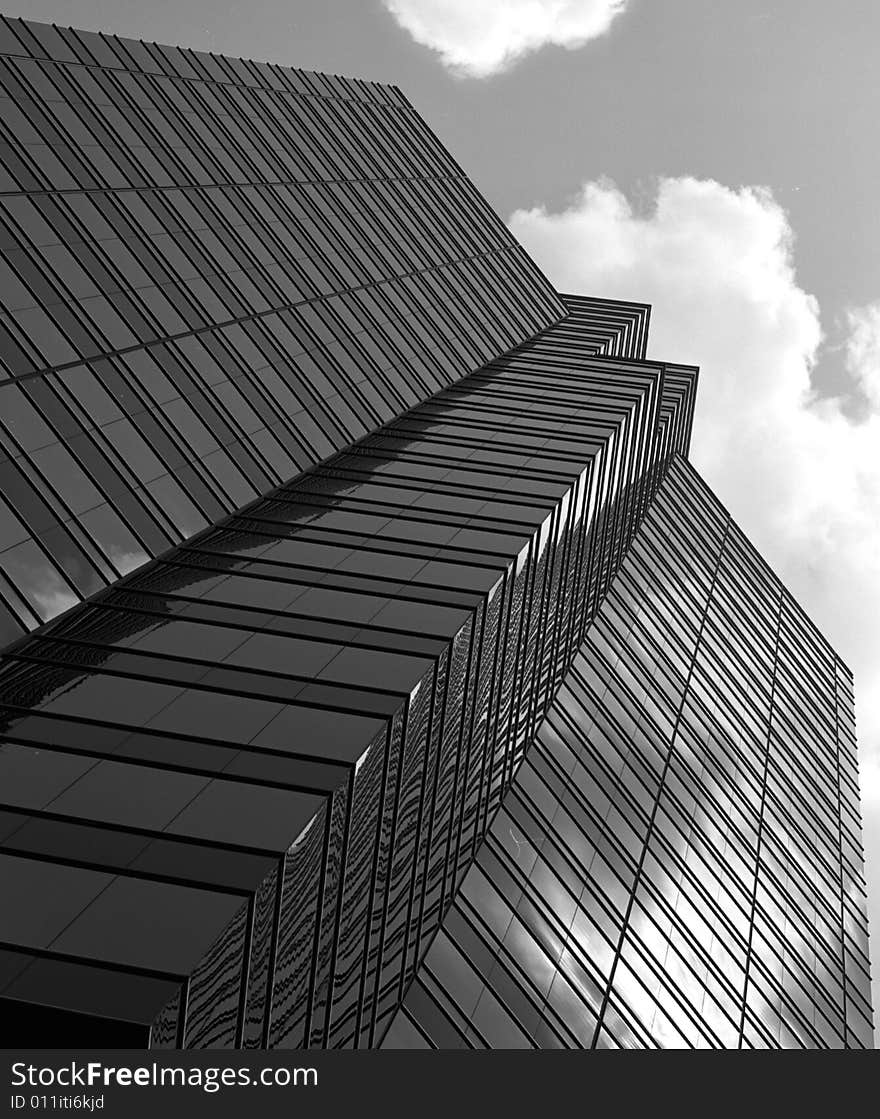 Black and White glass building and clouds