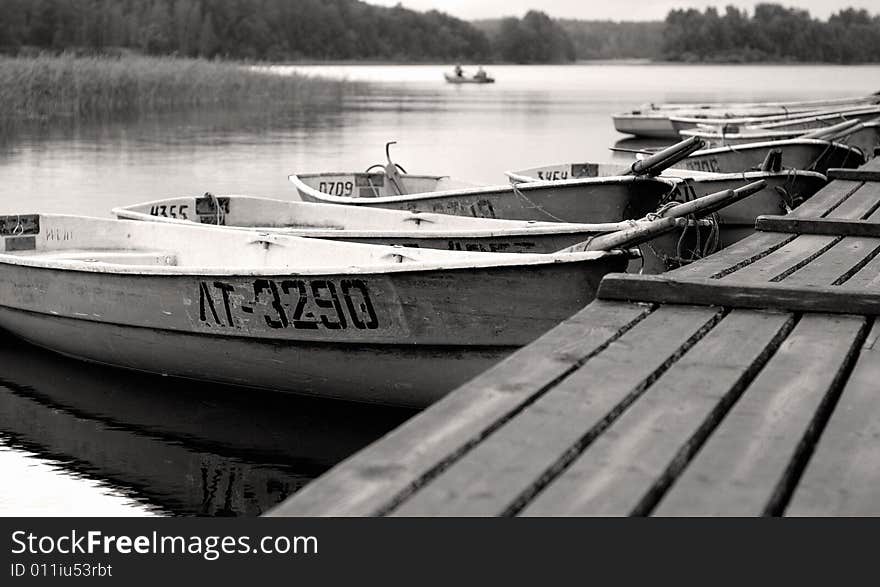 Boats on Vuoksa river (70 km from Saint-Peterburg, Russia) shot in the early morning. Boats on Vuoksa river (70 km from Saint-Peterburg, Russia) shot in the early morning