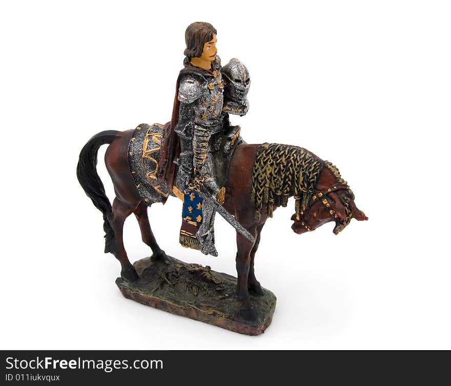 Small toy isolated knight horseman with sword. Small toy isolated knight horseman with sword