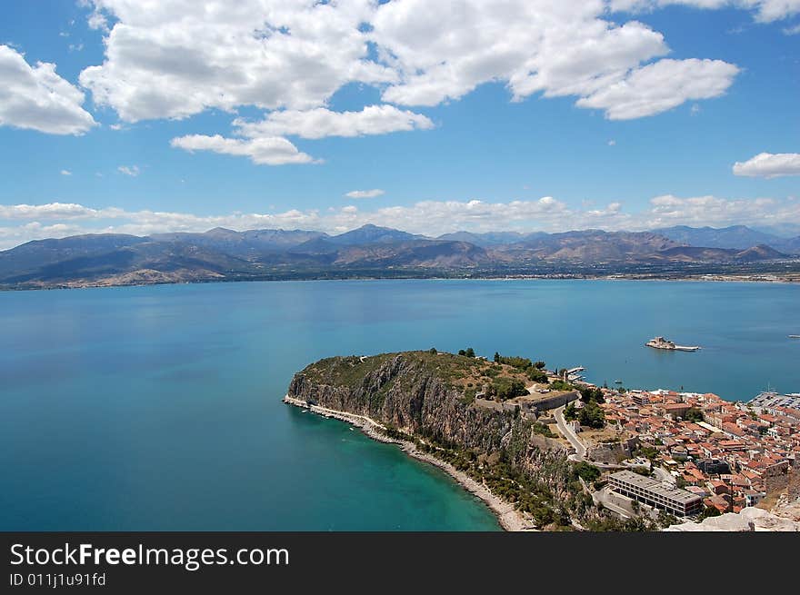 Castles Above Blue Sea Under Clouds