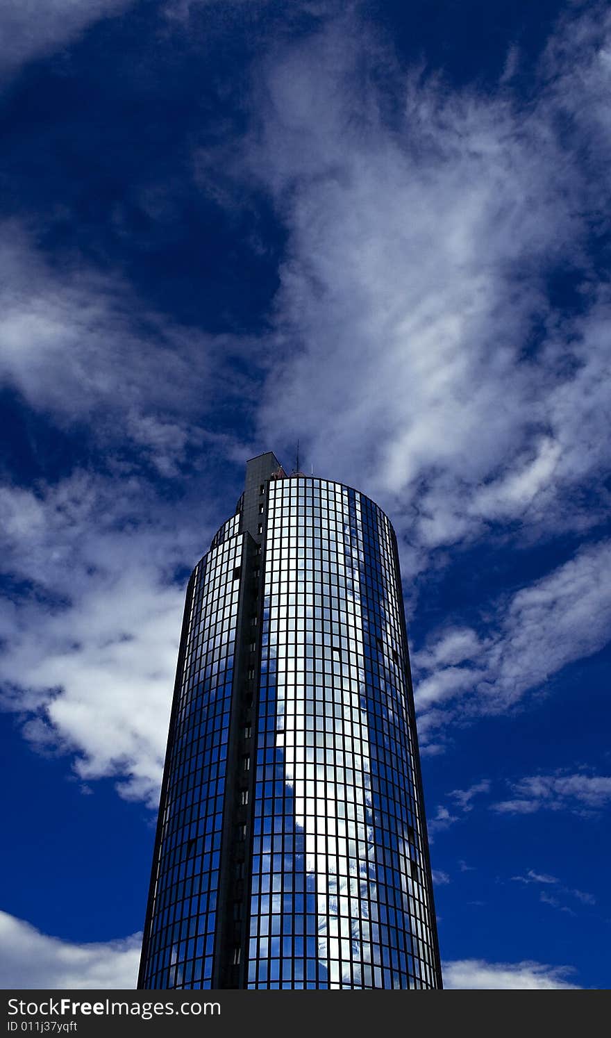 Skyscraper and sky with clouds