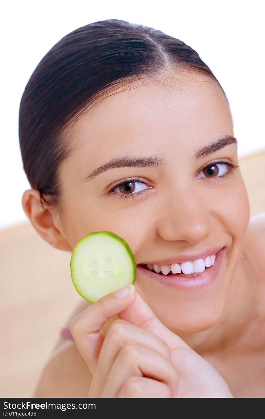 Woman Holding Cucumber Close Her Face