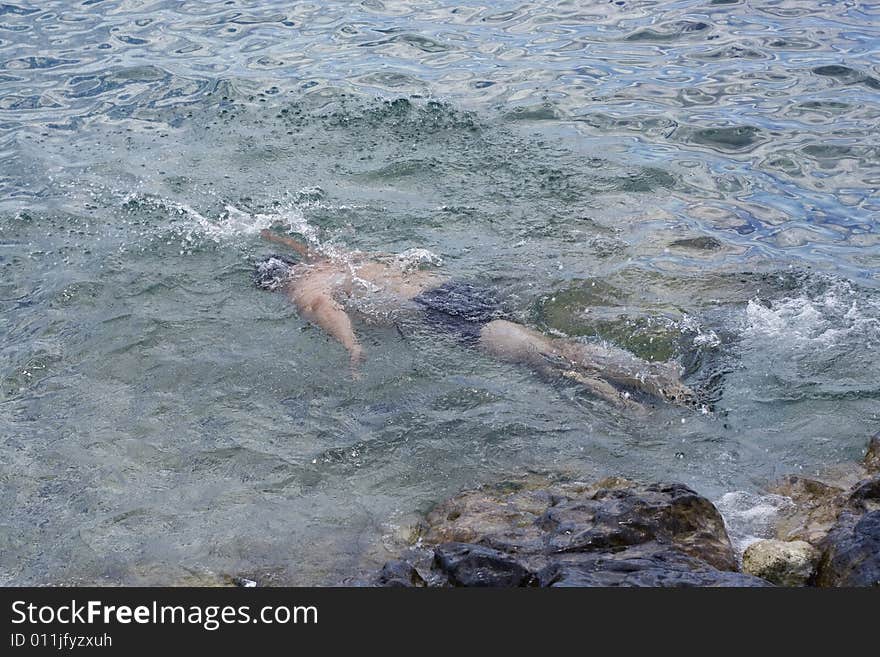 Man swimming in the sea