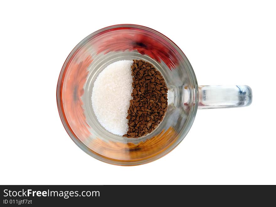 Instant coffee and sugar in glass cup isolated