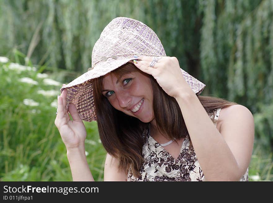 Coquettish Smiling Woman In Vintage Hat