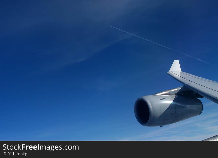 Wing of a passenger jet during flight. Wing of a passenger jet during flight