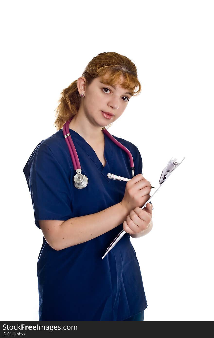 Young female doctor with stethoscope and writing pad over white background