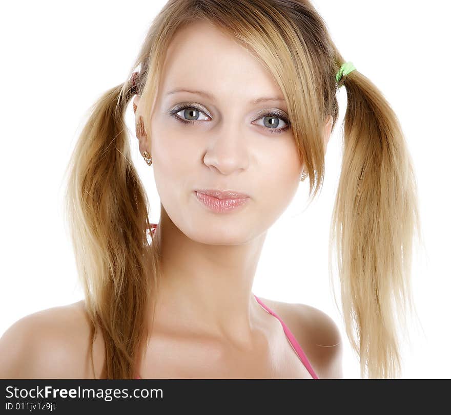 Beautiful woman. Portrait on a white background. Fashion photography.