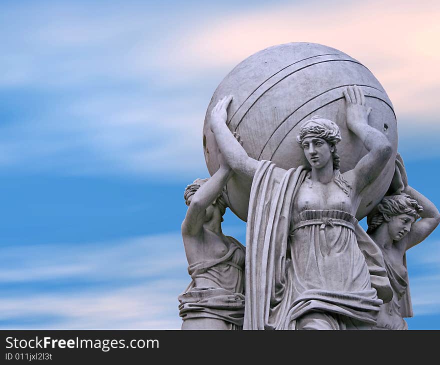 Allegorical statues about admiralty on a sky background. St.Petersburg , Russia