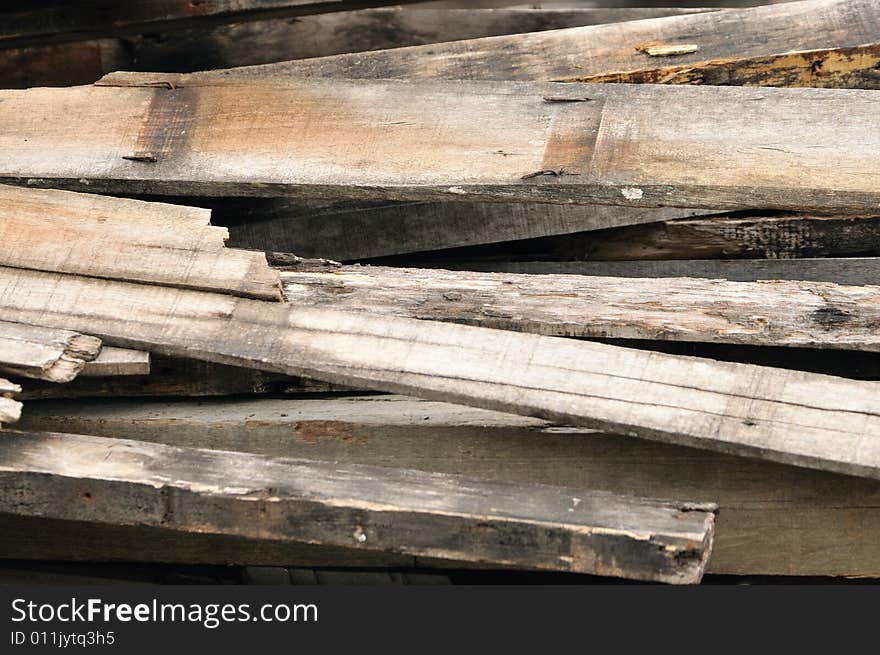 An image of a pile of planks. An image of a pile of planks