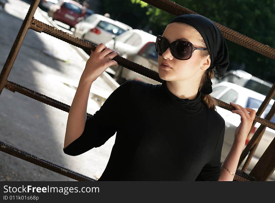 Beautiful Woman in Sunglasses and Kerchief