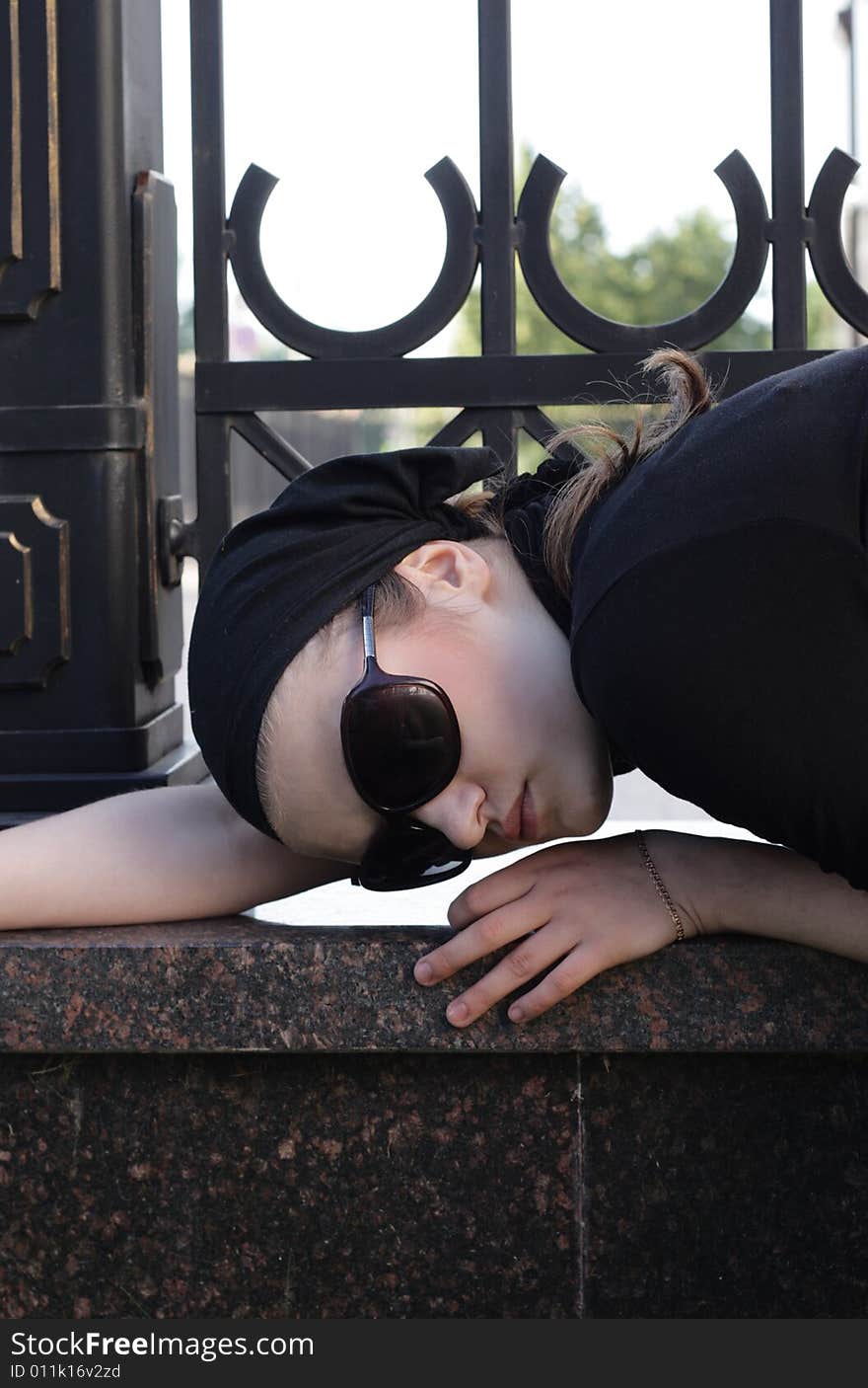 Beautiful Woman in Sunglasses and Kerchief