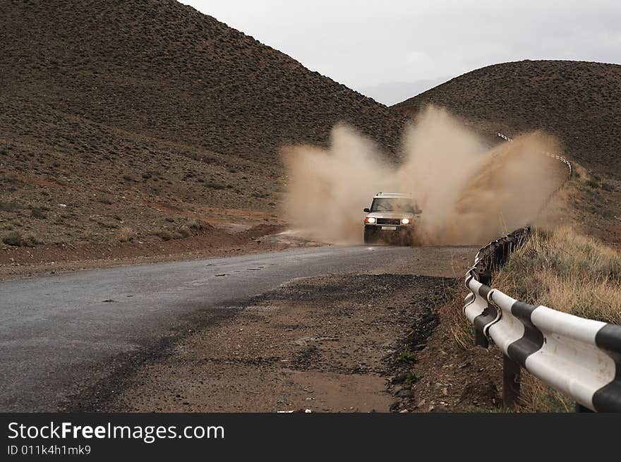 On mountain road in a SUV