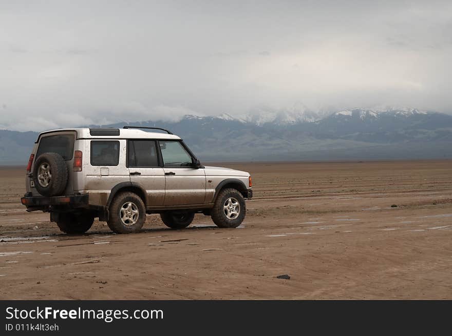 SUV Trek Across A Steppe