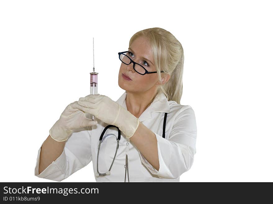 A Young Female Doctor/nurse Using A Syringe