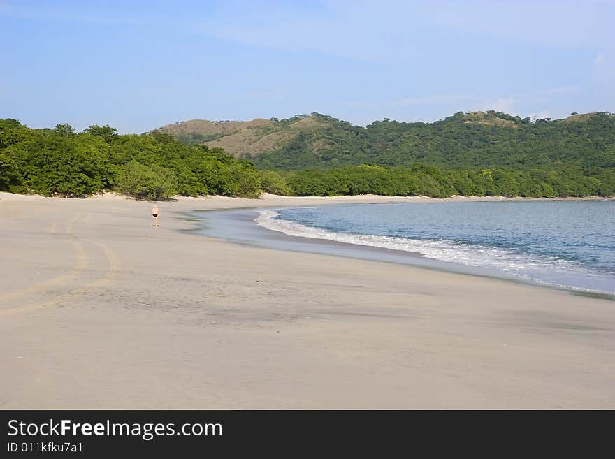 Lone Runner on Beach