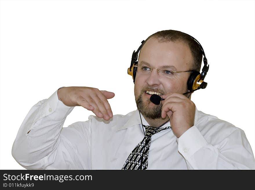 Male customer Representative with headset smiling during a telephone conversation. Male customer Representative with headset smiling during a telephone conversation