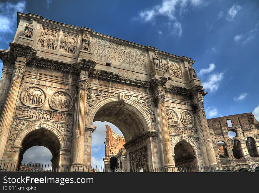 HDR image of the Roman Arch of Constantine and Colosseum.