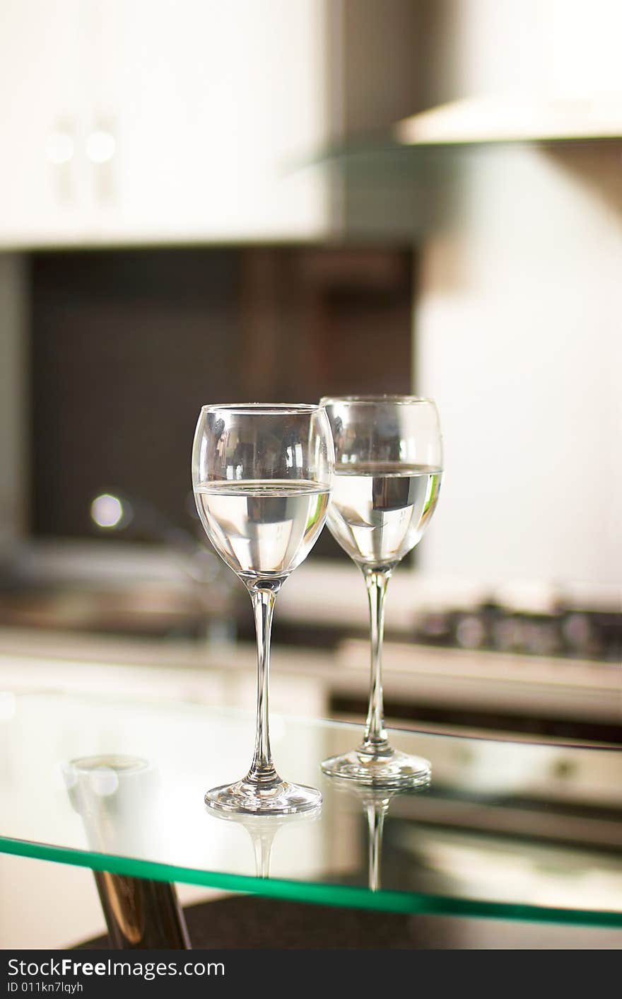 Two cups for wine in kitchen interior