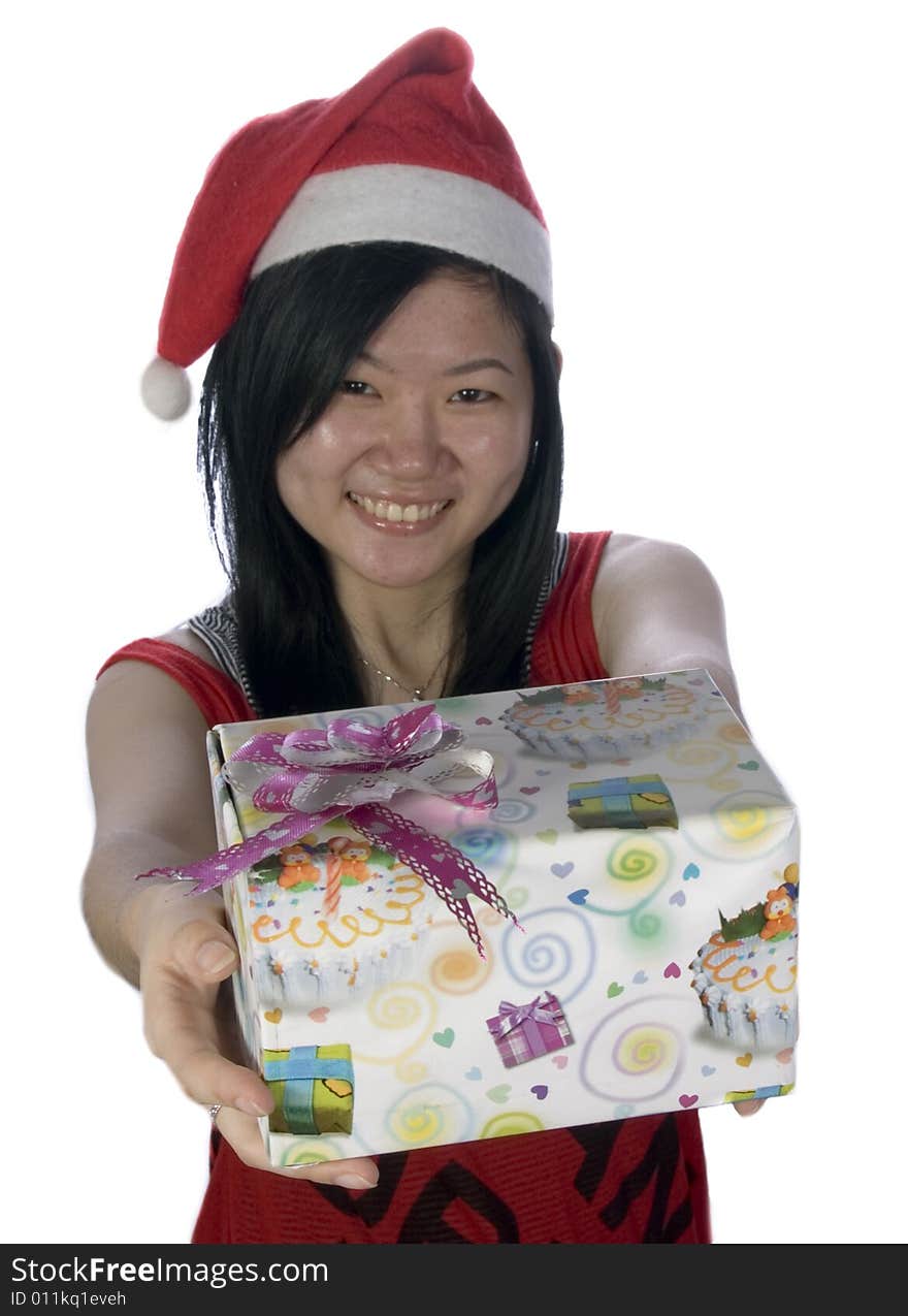 Portrait of a santa girl with hat and gift. Portrait of a santa girl with hat and gift